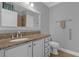Bathroom with granite countertop and updated vanity at 6320 S Sylvan Lake Dr, Sanford, FL 32771