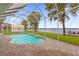 Relaxing screened in pool with a lake view at 6320 S Sylvan Lake Dr, Sanford, FL 32771