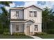 Two-story home with modern exterior and landscaping at 332 Belmond Dr, Debary, FL 32713