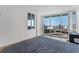 Main bedroom with hardwood floors and city view at 322 E Central Blvd # 1807, Orlando, FL 32801