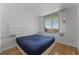 Bedroom with hardwood floors and built-in shelving at 322 E Central Blvd # 1807, Orlando, FL 32801