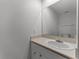 Small half bathroom with sink and toilet at 322 E Central Blvd # 1807, Orlando, FL 32801