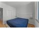 Spacious bedroom with hardwood floors and large closet at 322 E Central Blvd # 1807, Orlando, FL 32801