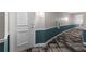 Clean and well-lit hallway with teal and white color scheme at 322 E Central Blvd # 1807, Orlando, FL 32801