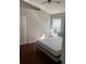 Bright bedroom with wood flooring and a ceiling fan at 2521 Oneida Loop, Kissimmee, FL 34747