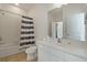 Clean bathroom with tub shower, toilet, and vanity at 4511 Monado Dr, Kissimmee, FL 34746