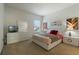 Bedroom with a TV, dresser and queen bed at 4511 Monado Dr, Kissimmee, FL 34746