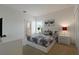 Bedroom with queen bed, nightstand and en-suite bathroom at 4511 Monado Dr, Kissimmee, FL 34746