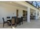 Outdoor patio with seating area and dining table at 4511 Monado Dr, Kissimmee, FL 34746