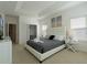 Main bedroom with king-size bed and en-suite bathroom at 4511 Monado Dr, Kissimmee, FL 34746