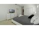 Bedroom with king-size bed and en-suite bathroom at 4511 Monado Dr, Kissimmee, FL 34746