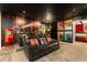 Home theater with luxurious seating and movie posters at 4537 Target Blvd, Kissimmee, FL 34746