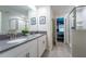 bathroom with double sinks and a shower at 4537 Target Blvd, Kissimmee, FL 34746