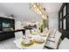 Bright dining room with a large table and seating for ten at 4537 Target Blvd, Kissimmee, FL 34746
