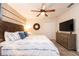 Primary bedroom with a king-size bed and TV at 4537 Target Blvd, Kissimmee, FL 34746