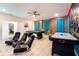 Game room with pool table, air hockey, and comfortable seating at 4537 Target Blvd, Kissimmee, FL 34746