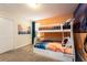 Bedroom with bunk beds and scenic wall art at 4537 Target Blvd, Kissimmee, FL 34746