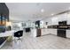 Modern kitchen with stainless steel appliances and open concept floor plan at 4537 Target Blvd, Kissimmee, FL 34746