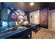 Star Wars themed bedroom with twin beds, ensuite bathroom, and fun wall decor at 4537 Target Blvd, Kissimmee, FL 34746