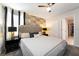 Bright bedroom with brick accent wall and comfortable bed at 4537 Target Blvd, Kissimmee, FL 34746