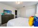 Bedroom with large bed and beach themed decor at 8896 Cabot Cliffs Dr, Davenport, FL 33896