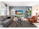 Cozy living room with comfortable seating and large TV at 8896 Cabot Cliffs Dr, Davenport, FL 33896