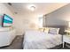 Main bedroom with large bed and gold accents at 8896 Cabot Cliffs Dr, Davenport, FL 33896
