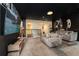 Spacious theater room, large TV, and comfortable seating at 8896 Cabot Cliffs Dr, Davenport, FL 33896