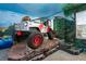 bedroom with Jurassic Park theme, custom bed, and mural at 8896 Cabot Cliffs Dr, Davenport, FL 33896