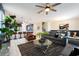 Open living room with comfortable seating and modern decor at 8896 Cabot Cliffs Dr, Davenport, FL 33896