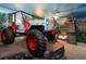 Unique Jurassic Park themed bedroom with jeep bed at 8896 Cabot Cliffs Dr, Davenport, FL 33896