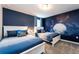 Bedroom with two beds and Peter Pan mural at 8896 Cabot Cliffs Dr, Davenport, FL 33896
