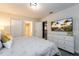 Main bedroom with a large bed and white dresser at 8896 Cabot Cliffs Dr, Davenport, FL 33896