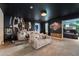 Home theater with comfortable seating and movie-themed decor at 8896 Cabot Cliffs Dr, Davenport, FL 33896