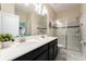 Clean bathroom with double vanity and large shower at 8896 Cabot Cliffs Dr, Davenport, FL 33896