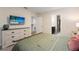 Spacious bedroom with a dresser and ensuite bathroom at 8896 Cabot Cliffs Dr, Davenport, FL 33896