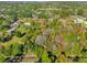 Wide shot of land with surrounding homes and trees at 18746 Seaford Ave, Orlando, FL 32820