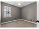 Spacious bedroom with neutral walls and ceiling fan at 41 E Spruce St, Orlando, FL 32804