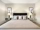 King-size bed in a bright and airy bedroom at 1861 Sawyer Palm Pl, Kissimmee, FL 34747