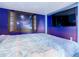 Bright bedroom with a Frozen theme, featuring a large mural and comfortable bedding at 1861 Sawyer Palm Pl, Kissimmee, FL 34747