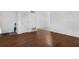Bright living room with wood-look floors and an open floor plan at 2319 Continental Blvd, Orlando, FL 32808