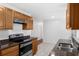 Kitchen features granite countertops and ample cabinet space at 2319 Continental Blvd, Orlando, FL 32808