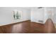 Spacious living area with large windows and wood-look flooring at 2319 Continental Blvd, Orlando, FL 32808
