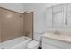 Clean bathroom with beige tile and white vanity at 2319 Continental Blvd, Orlando, FL 32808
