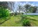 Large backyard with lush green grass at 2319 Continental Blvd, Orlando, FL 32808
