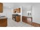 Open kitchen with granite countertops and stainless steel appliances at 2319 Continental Blvd, Orlando, FL 32808