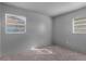 Simple bedroom with grey walls and carpet at 2319 Continental Blvd, Orlando, FL 32808