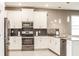 Modern kitchen with stainless steel appliances and corner sink at 4535 Narrative Ln, Kissimmee, FL 34746