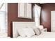 Bedroom with king-size bed and neutral decor at 4535 Narrative Ln, Kissimmee, FL 34746