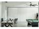 Game room with air hockey, billiard table, and seating area at 4535 Narrative Ln, Kissimmee, FL 34746